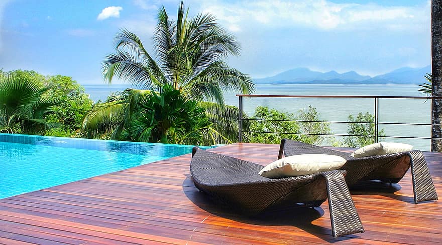luxury resort ranong thailand andaman sea swimming pool loungers relaxing peaceful